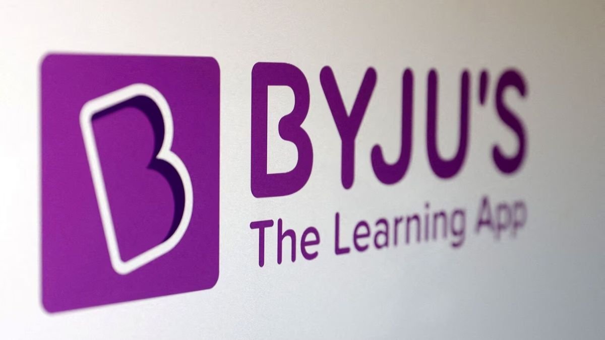 Byju's logo with bankruptcy headlines, symbolizing financial crisis.