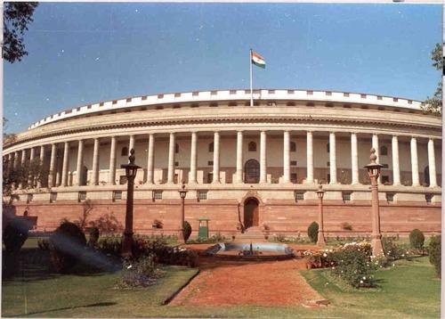 Parliament session in progress with leaders discussing key national issues.